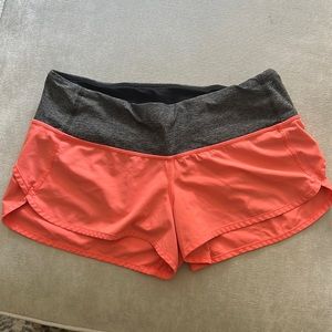 Lululemon, size 8, pink/grey shorts.